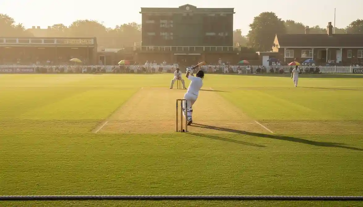 Cricket scorebord toont een hoog runs totaal tijdens een wedstrijd op een zonnig cricketveld